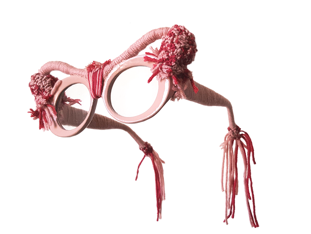 Wonder glasses design project made of pink and red wool thread