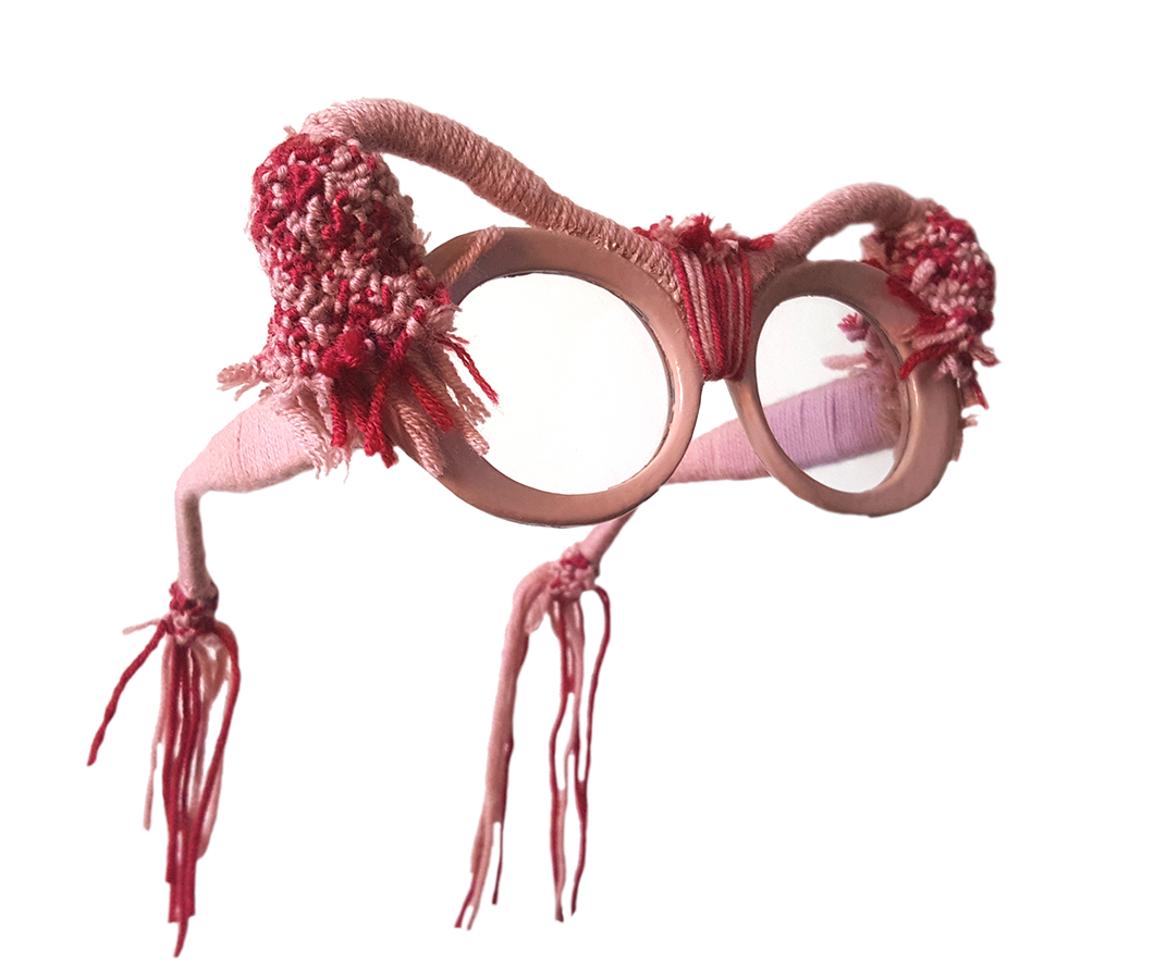 Wonder glasses design project made of pink and red wool thread